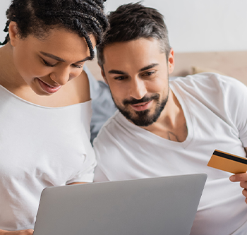 couple cuddling on couch