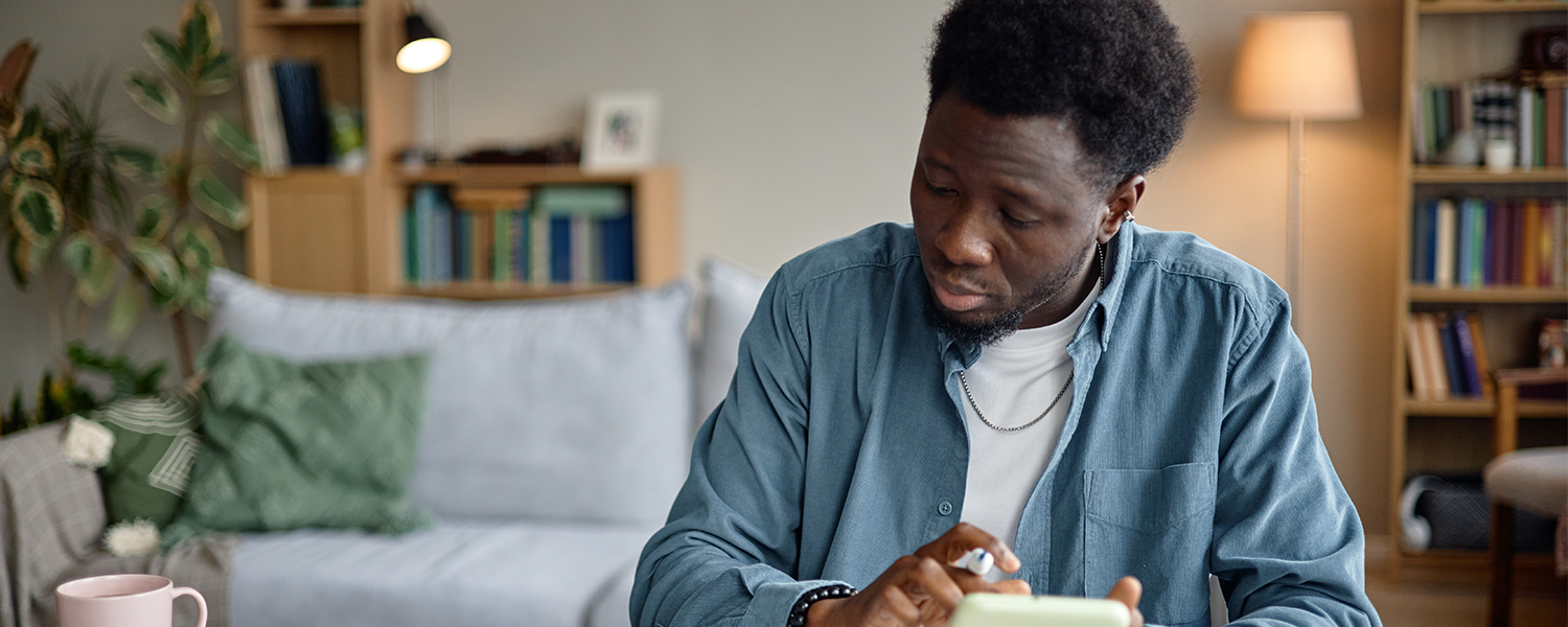 man using a calculator