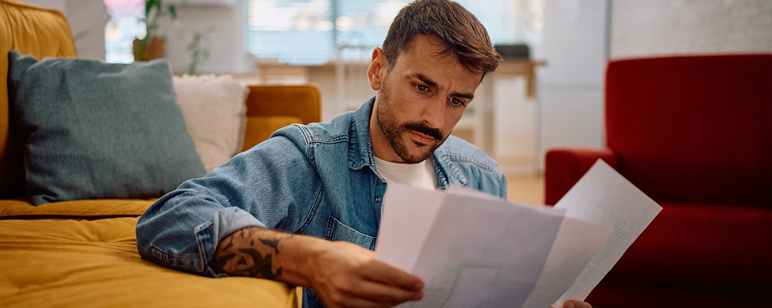 man looking over some paperwork