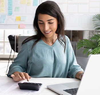 woman doing financial paperwork