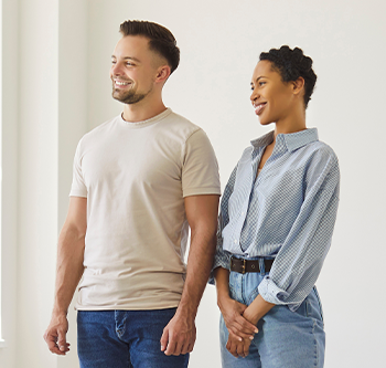 two people talking to a real estate agent