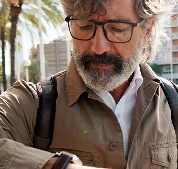 man looking at his watch