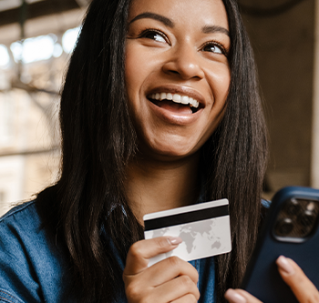 woman holding credit card