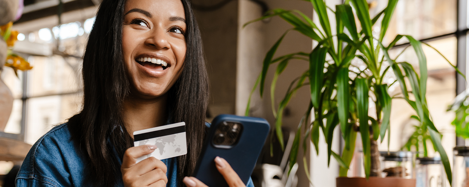 woman holding credit card