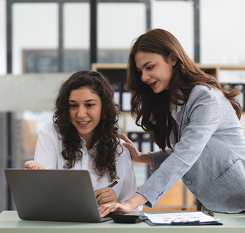 woman explaining things to another woman