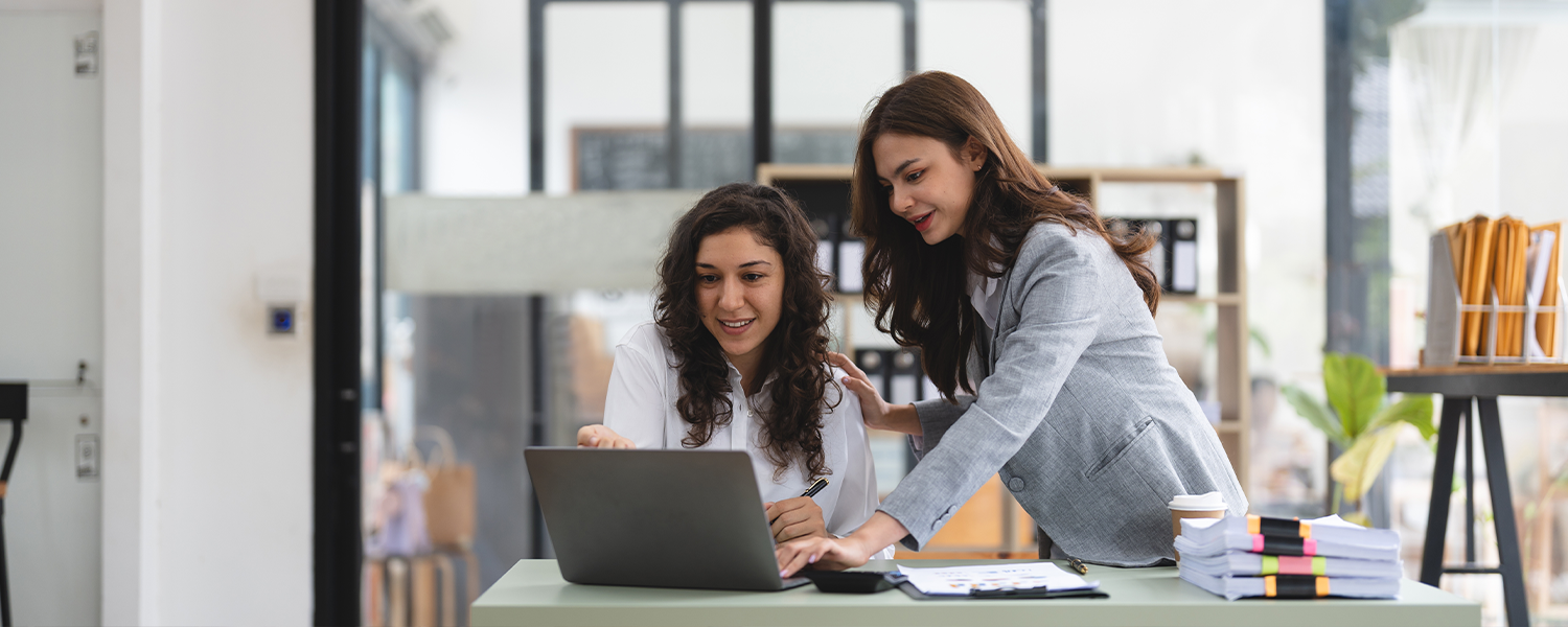 woman explaining things to another woman