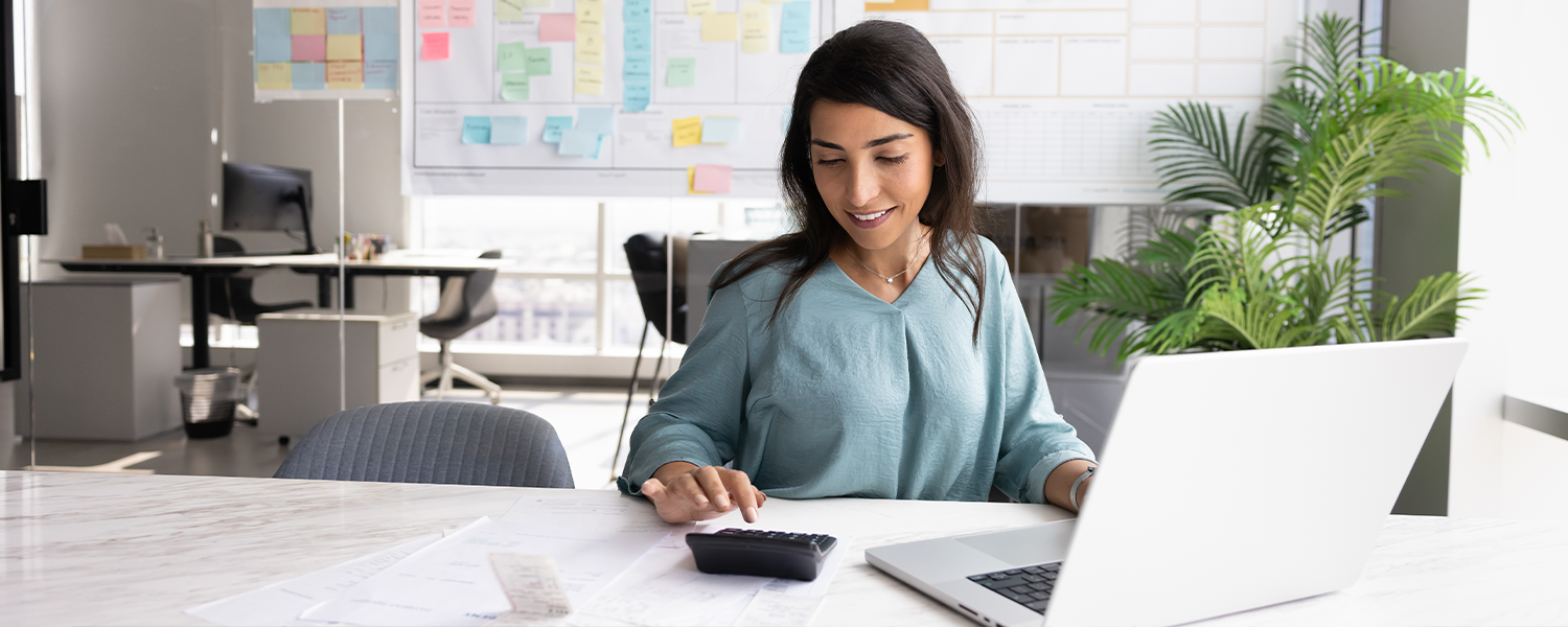woman doing financial paperwork