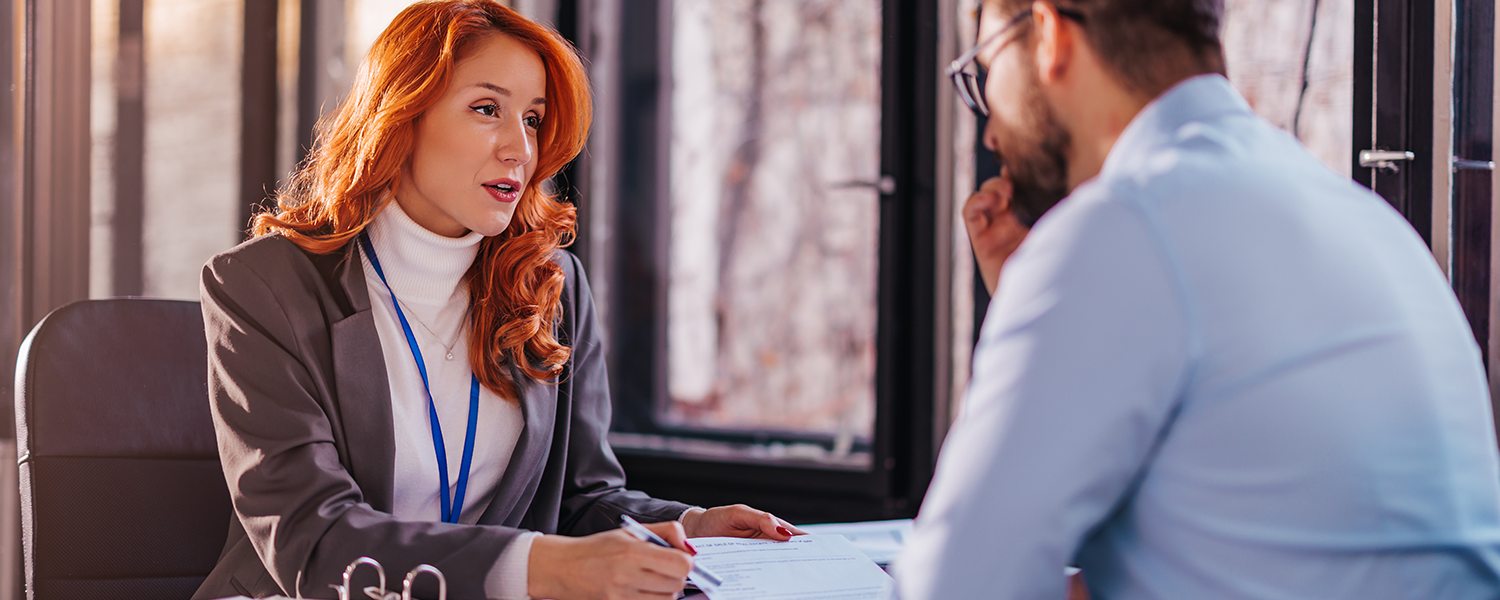 woman explaining financials to man