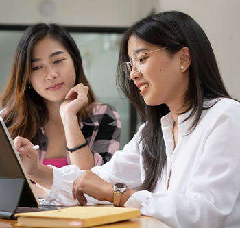 two college students studying