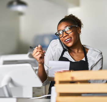 businesswoman looking at credit cards