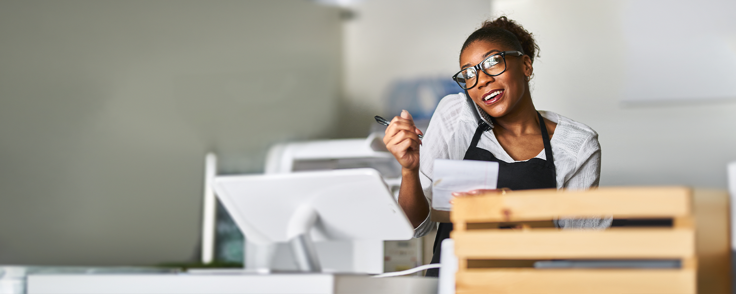 businesswoman looking at credit cards