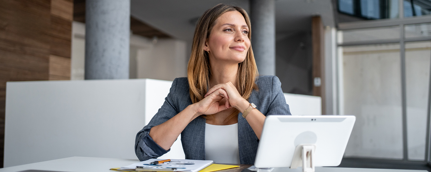 woman at desk with computer