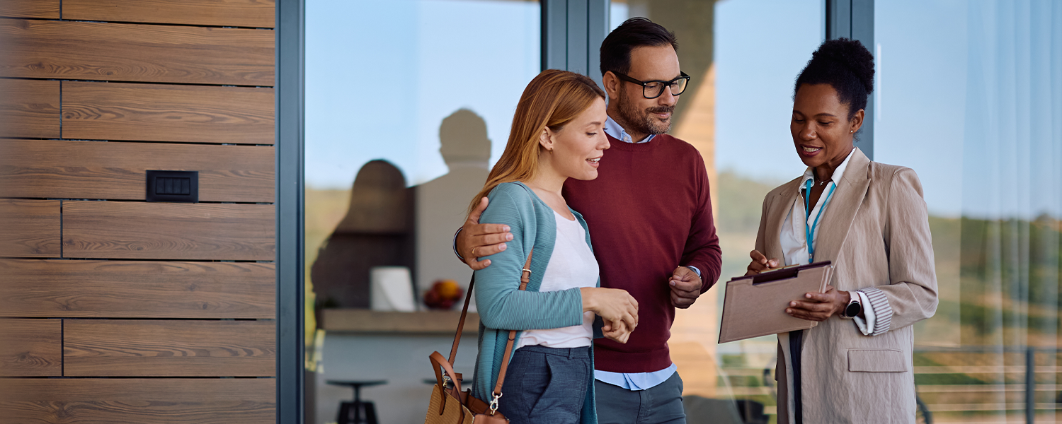 realtor talking to couple