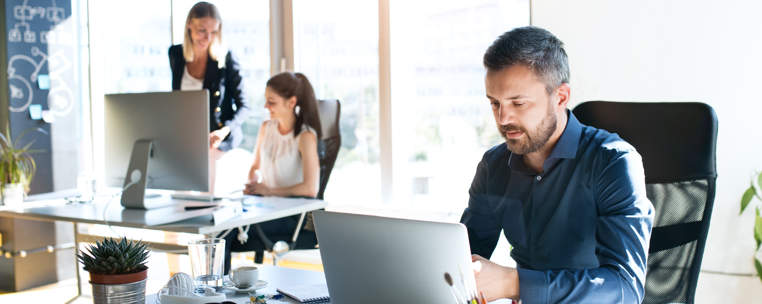 man on office computer