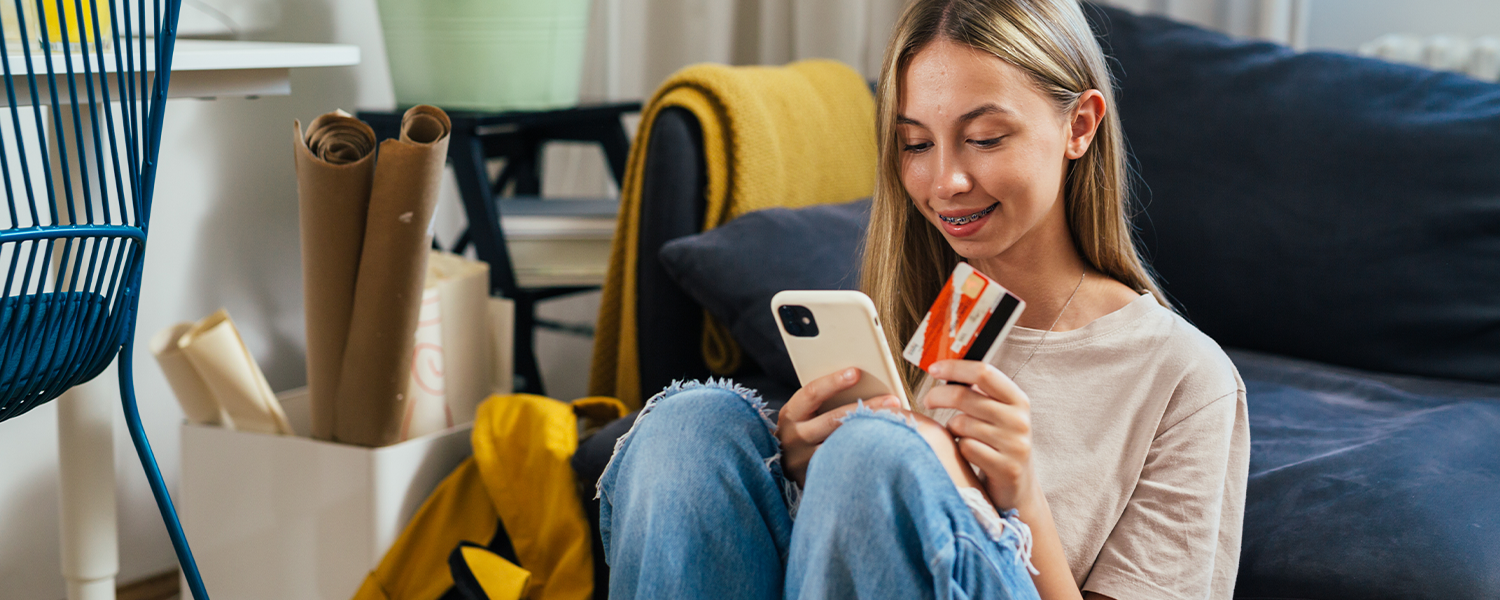 teenager with credit card
