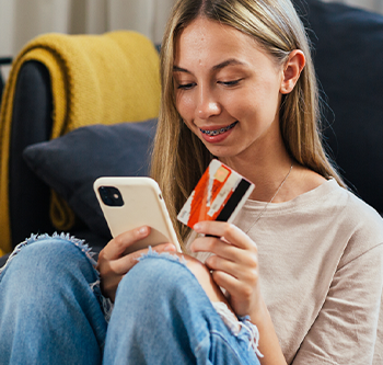 teenager with credit card