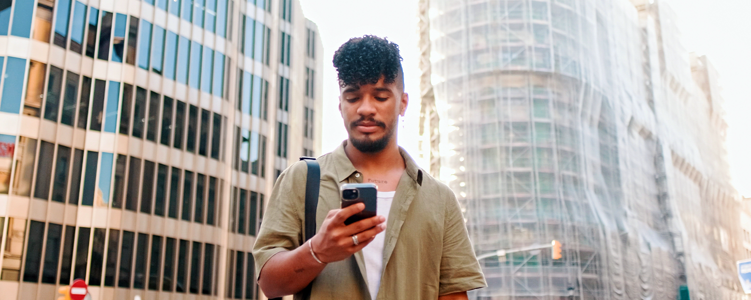 man looking at his phone