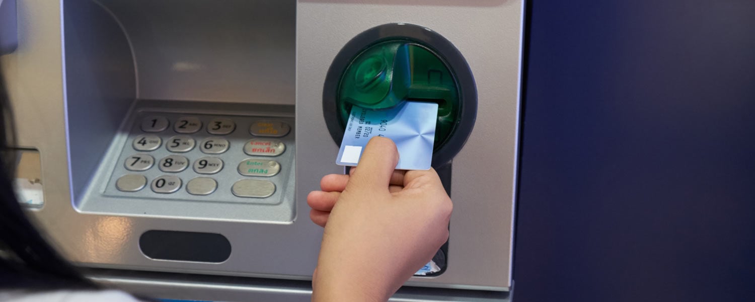 Woman using an ATM