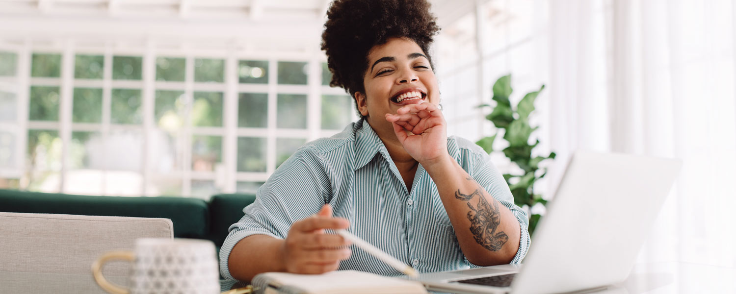 Woman leaning on her hand and smiling