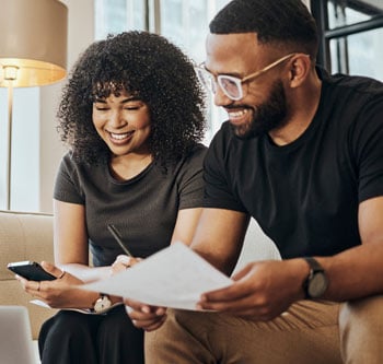 Couple looking over paperwork together