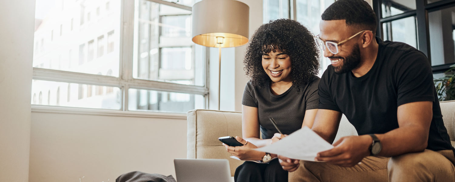 Couple looking over paperwork together