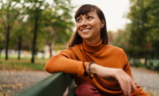 Woman looking away smiling