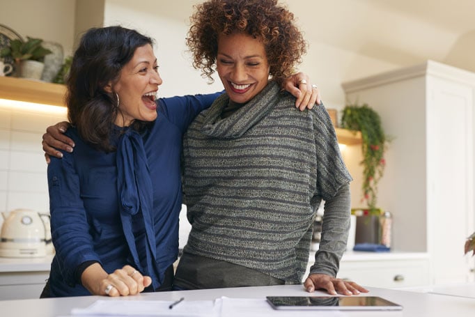 Two women hugging