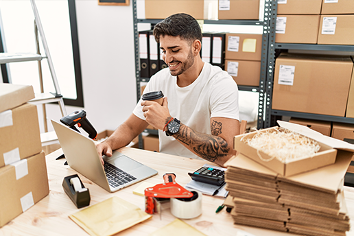 Business owner making purchases on his laptop.