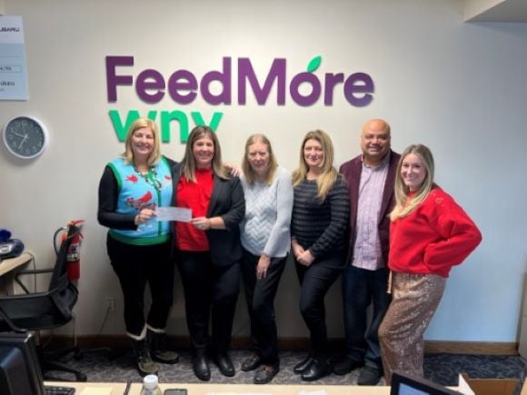 Group of FeedMore WNY employees accepting $10,000 check