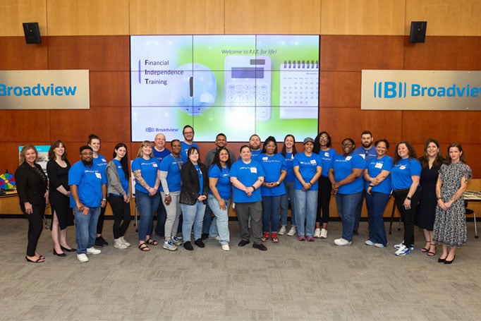 A large group of Broadview employees standing together at the FIT event.