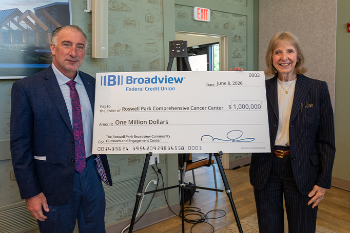 broadview ceo michael castellana posing with giant check