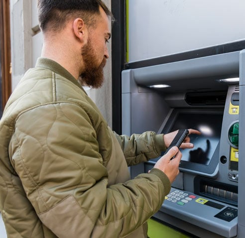 Man using the ATM