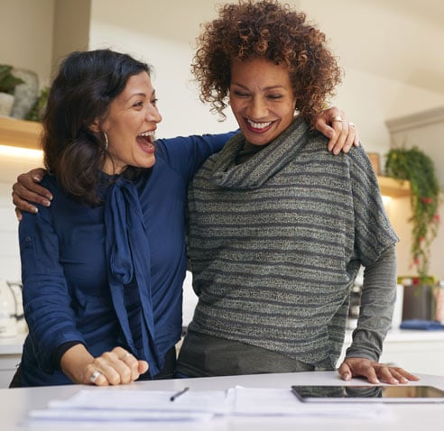 Two women hugging