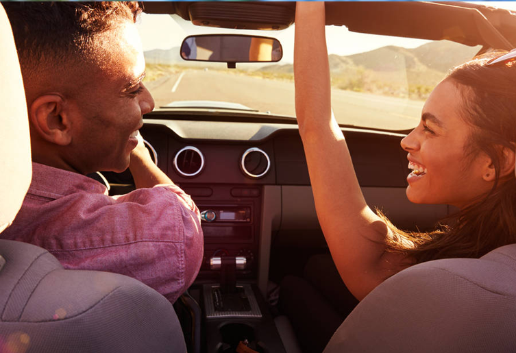 Couple opening sunroof