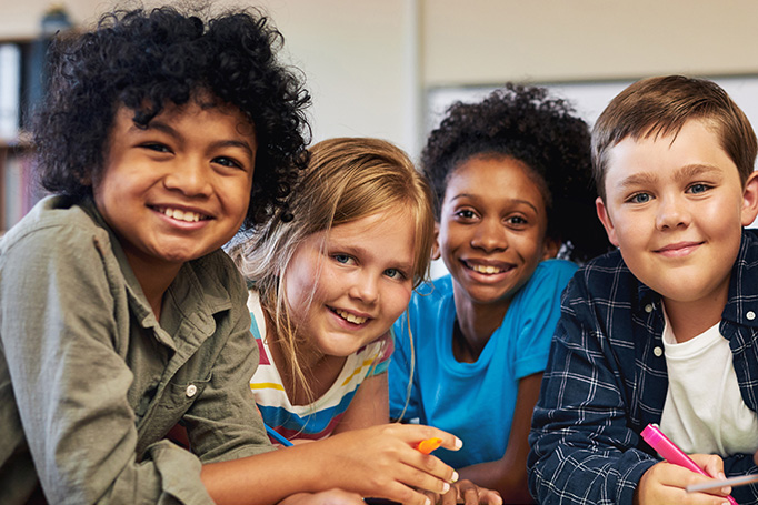 Groups of kids smiling